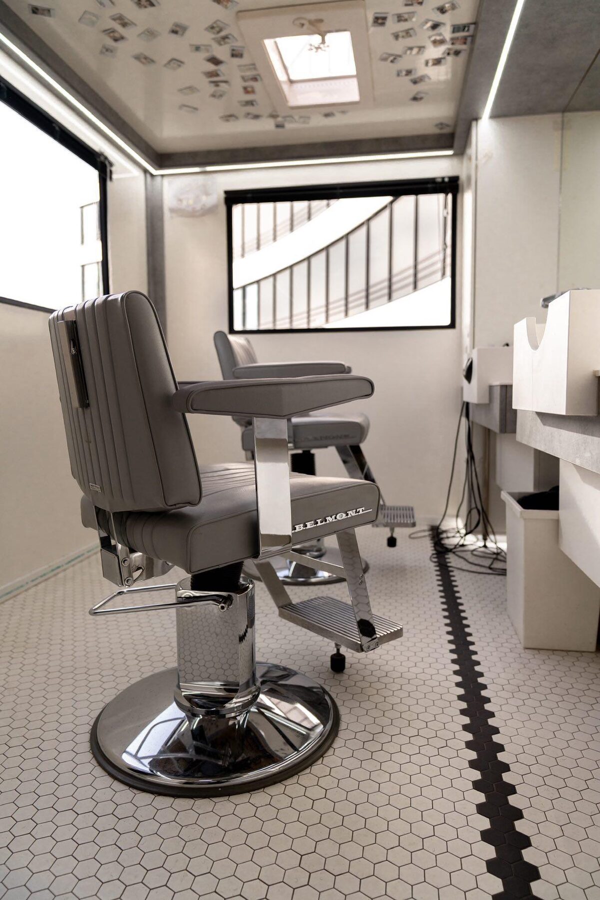 Inside the Barber Truck — BELMONT chairs, hexagon tiling